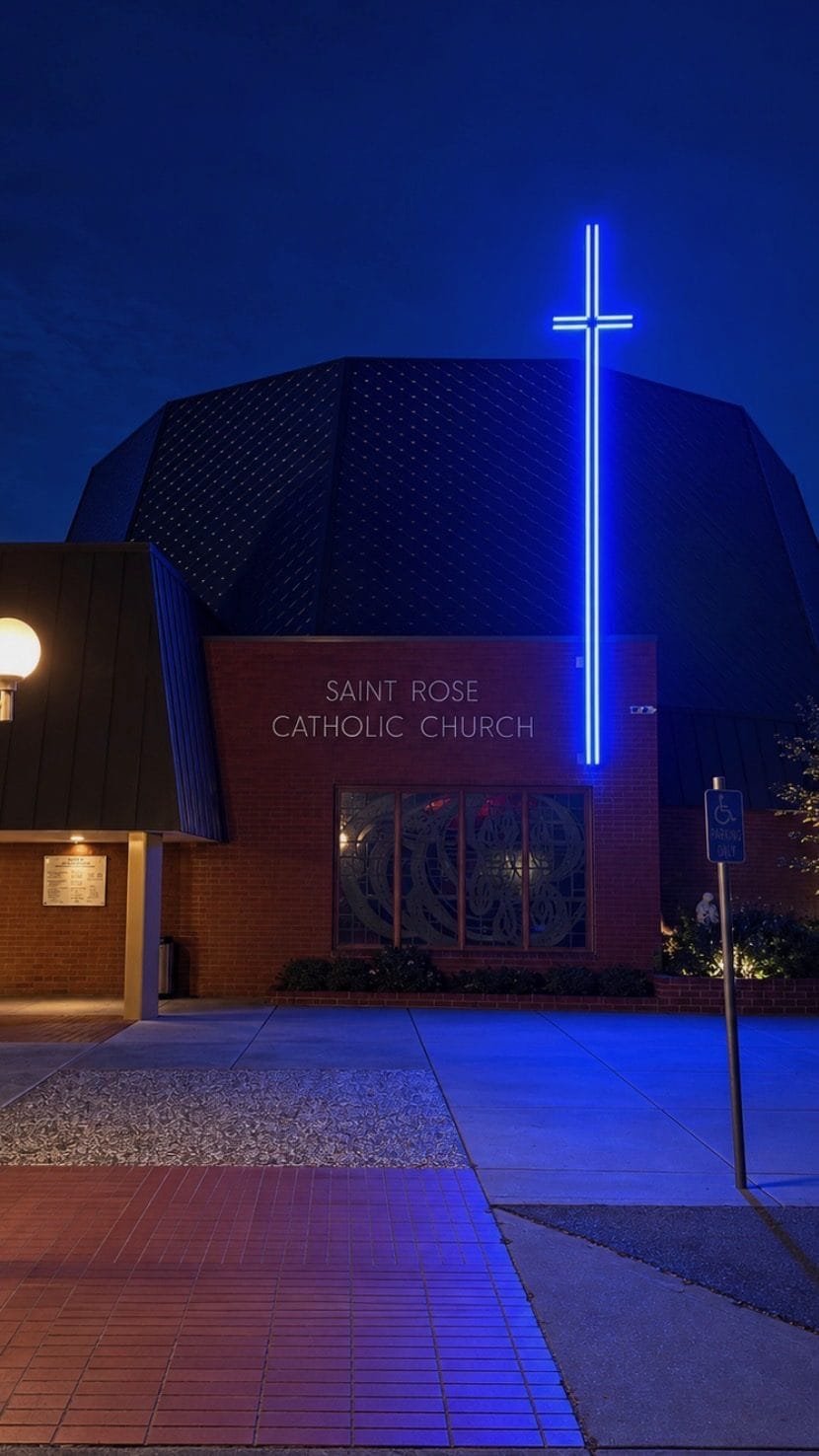 LED cross lighting installed by Prime Electric at Saint Rose Catholic Church, color-changing blue